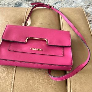 Calvin Klein pink crossbag with inner pockets one zippered